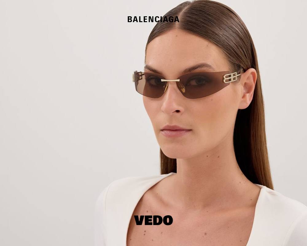 Balenciaga BB 0484S Wraparound Rimless Sunglasses gold vedo