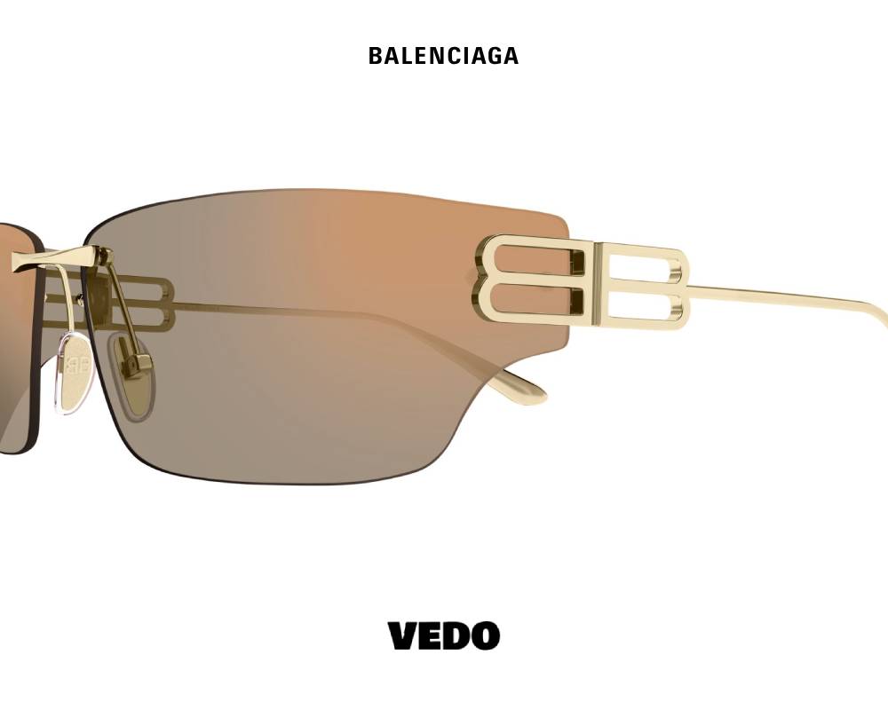 Balenciaga BB 0485S Wraparound Rimless vedo Sunglasses gold